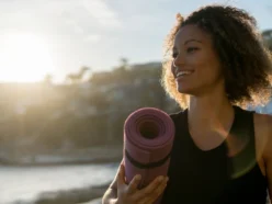 woman-holding-yoga-mat_getty